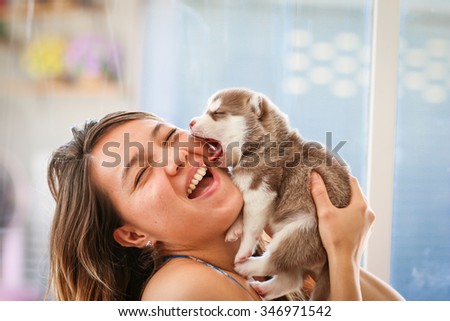 happy women playing puppy dog.