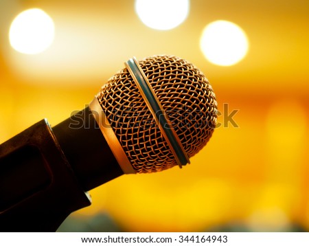 microphone in meeting room or conference room with blurred light background