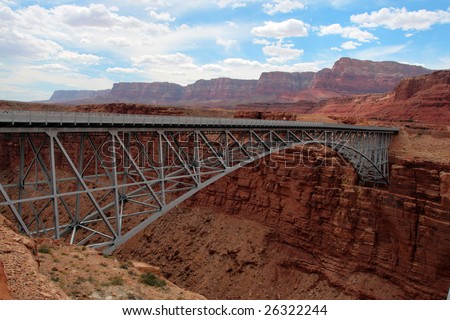Navajo Bridge crosses the Colorado River\'s Marble Canyon near Lee\'s Ferry in the U.S. state of Arizona