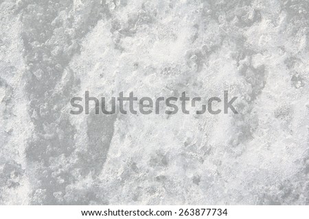 surface of the ice: a variety of textures and drawings on the frozen water