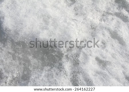 Ice: A variety of textures and drawings on the frozen water