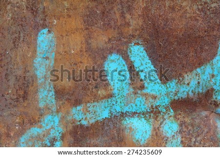 rusty metal surface with blue paint lines