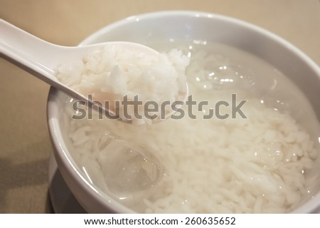 Traditional Thai food [Kao Chae] Cooked jasmine rice soaked in iced water served with complementary food