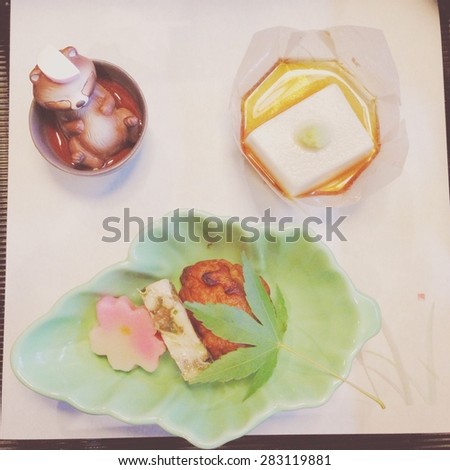 Japanese Starter Set : shrimp ball, tofu, raccoon mini figure. Toned photo. Warm tone
