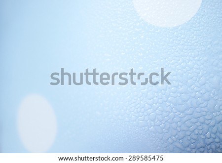 Abstract of Water Drops on Pastel Blue with Polka Dot Bucket, Blur, Soft Focus, Texture/ Wallpaper/Background. Relax and Refreshing Concept