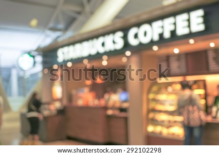 OSAKA, JAPAN - JUN 3, 2015 : Abstract Blur Photo of Starbucks Coffee at Kansai Airport, Osaka. Starbucks is the largest coffee house company and franchises in the world.