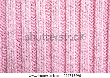 Closed up Texture of Knitted Pink Sweater, Background, Wallpaper [Selective Focus on the front]