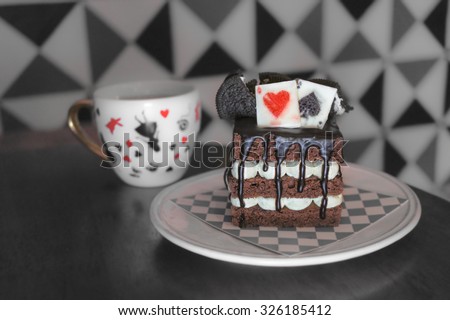 Brownie Chocolate Cake and a cup of tea, Alice in Wonderland Theme, low key