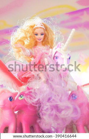 BANGKOK - Jan 9, 2016 : Barbie on Unicorn surrounding with ponies from My Little Pony for display. Barbie is a fashion doll manufactured by the American toy-company Mattel and launched in March 1959.