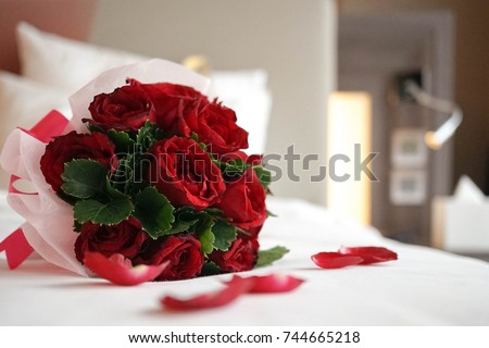 Rose bouquet. Soft focus of a Rose bouquet on a bed, romantic, honeymoon and Valentine\'s concept.