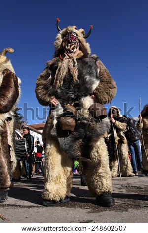 Bulgaria - jan 31, 2015: Man in traditional masquerade costume is seen at the the International Festival of the Masquerade Games \