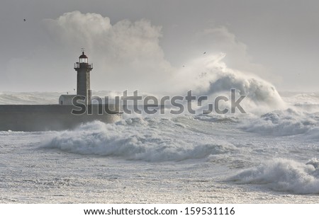 Storm Waves Over The Lighthouse, Portugal