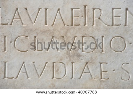 Part of a Latin inscription on an ancient Roman tomb