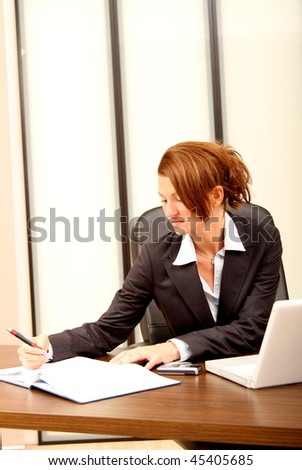 Business woman checking her agenda