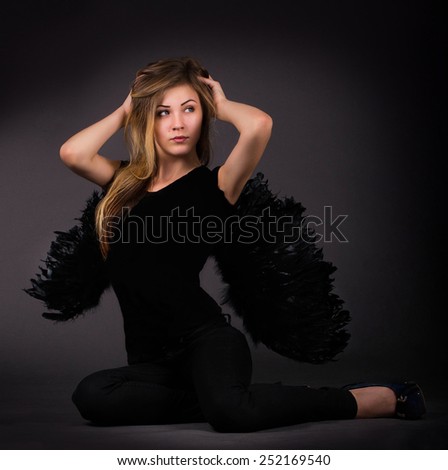 girl with wings in black,the standard of beauty,