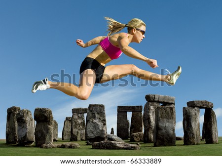 Track and field athlete hurdles over Stonehenge.