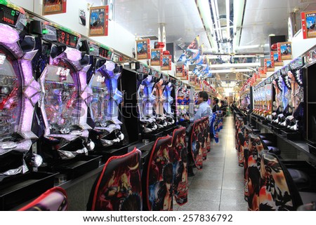 Osaka, Japan - May 27, 2013: Parlor of Pachinko, a type of mechanical game originating in Japan, is used as a recreational arcade game and gambling device.