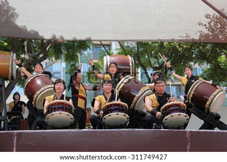 Los Angeles, California, USA - August 16, 2015: Japaneses are performing Japanese percussion instruments at Nisei Week Japanese Festival in Little Tokyo, Los Angeles.
