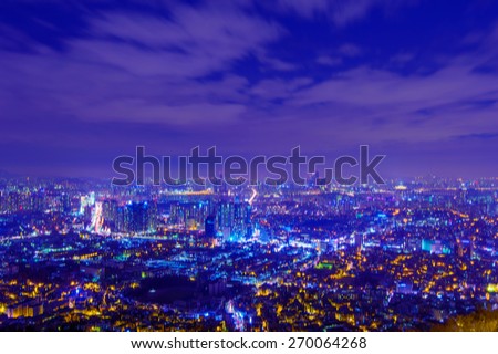 South Korea skyline at night with blur motion,blurred background.