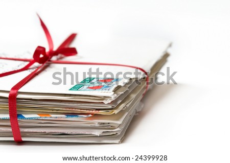 Stack of Love Letters with a Red Ribbon