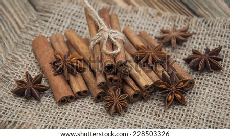 Spices set.Cinnamon stick,star anise on a wooden background