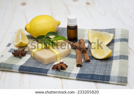 Lemon handmade soap with essential oils and lemon on a white background