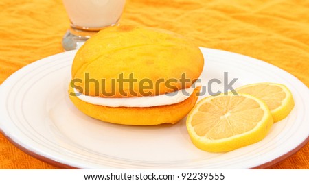 Lemon Flavored Whoopie Pie On Plate With Lemon Slices
