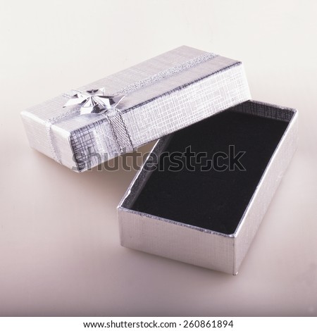 Gift box silver and black open and empty