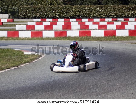 Running go kart driving on a curve
