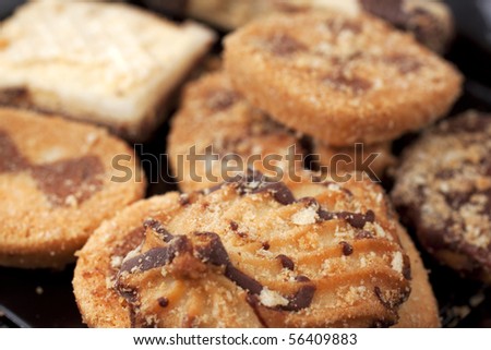 Close up of various types of biscuits, part chocolate
