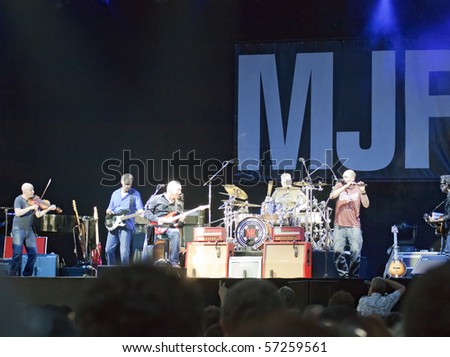 MILANO, ITALY - JULY 14: Singer and guitarist Mark Knopfler on stage of his own concert for \