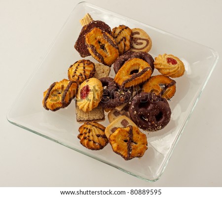 Assorted biscuits of different kind on a glass plate