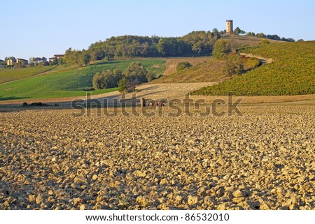 View of fields and hills, under the blue sky