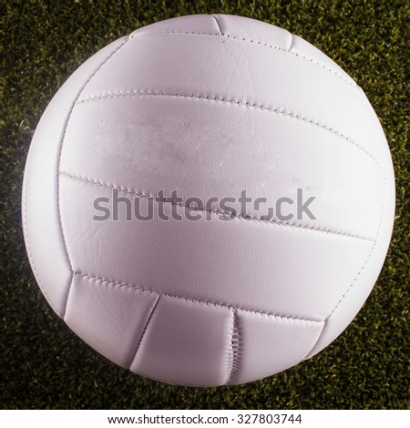 White Volley ball over grass, square image
