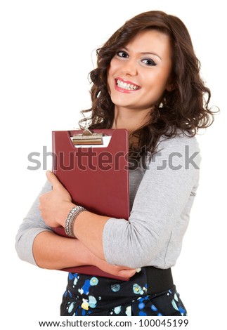 casual young student woman with clipboard looking at camera, white background