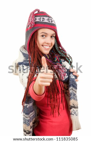 teenage girl in winter clothes with thumb up, white background