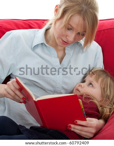 mother and daughter with curiosity reading book