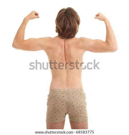 stock photo standing back naked man in panties with raised arms
