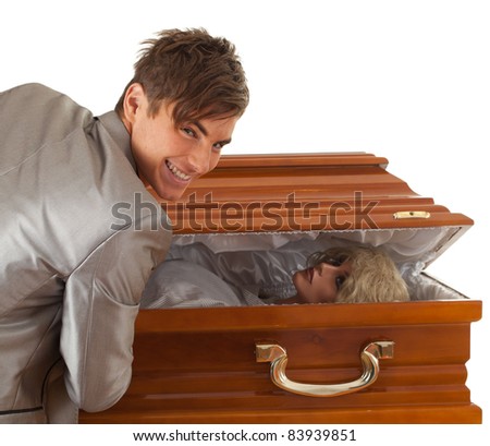 halloween joke, man with coffin - stock photo