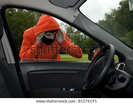 Burglar wearing a mask (balaclava), car burglary, series