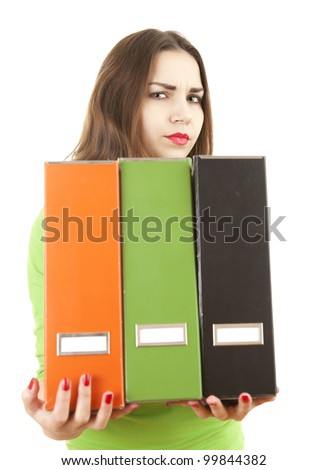 tired young woman keeping file binders, white background