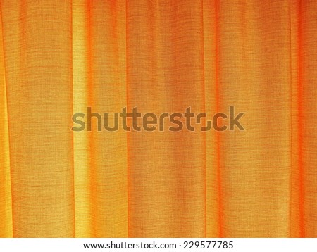 Golden looking curtain texture for background of any contents objects. Elegant looking glowing texture remind the good, the wealthy, the prosper, or golden moment of time.