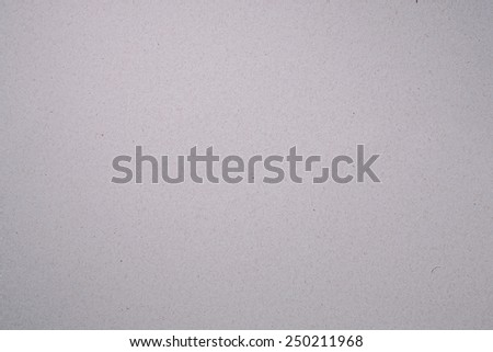 Recycled Paper Texture Background. Top View of a Recycled Paper Surface with Fibers. Text Space. Studio Lighting