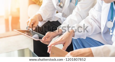 Doctor teamwork, orthopedic surgeon, orthopedist, ER surgery team working in hospital medical clinic office meeting room discussing on diagnostic exam on patient care operation professional service