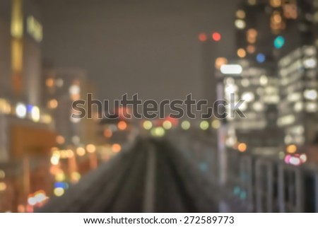 Blurred abstract background of Tokyo night bokeh lights on railway