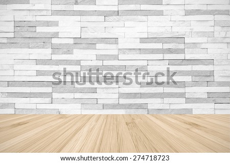 White grey colour brick tile textured wall with wood floor in light yellow cream color tone: Stone tile wall with wooden floor for interior backgrounds