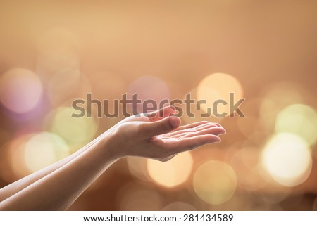 Empty female women open human hand prayer palms up Candle night light natural warm gold lantern bokeh Pray support aid destiny help peace campaign: Holy spirit week: World religion day: Eid mubarak