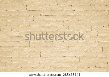 Brick wall pattern texture background painted in light yellow beige color tone: Empty masonry wall textured backdrop in yellow beige colour
