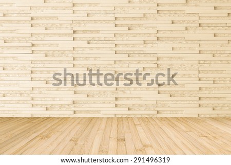 Modern marble tile wall pattern  background in light cream beige color with wooden floor in yellow cream tone : Horizontal marble rock stone tiled pattern texture backdrop with wood flooring