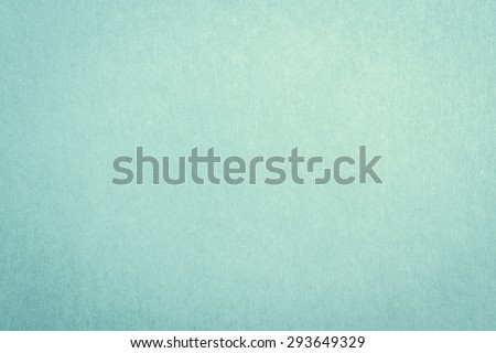 Recycled craft paper textured background in light green cyan blue color tone: Detailed texture of recycled kraft paper fiber in pastel toned style